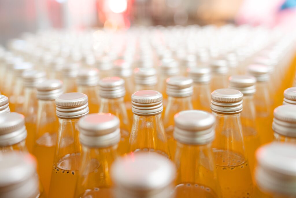 Bottled fruit beverage production illustrating ingredient cost in the finished application