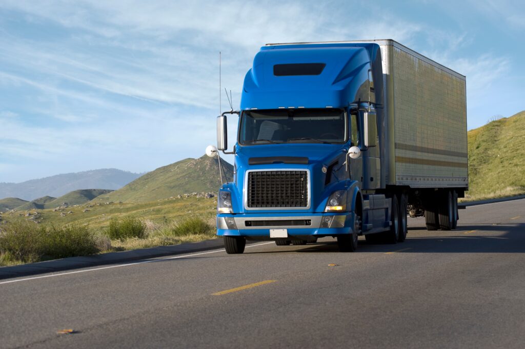 Freight truck transporting fruit ingredients on a highway